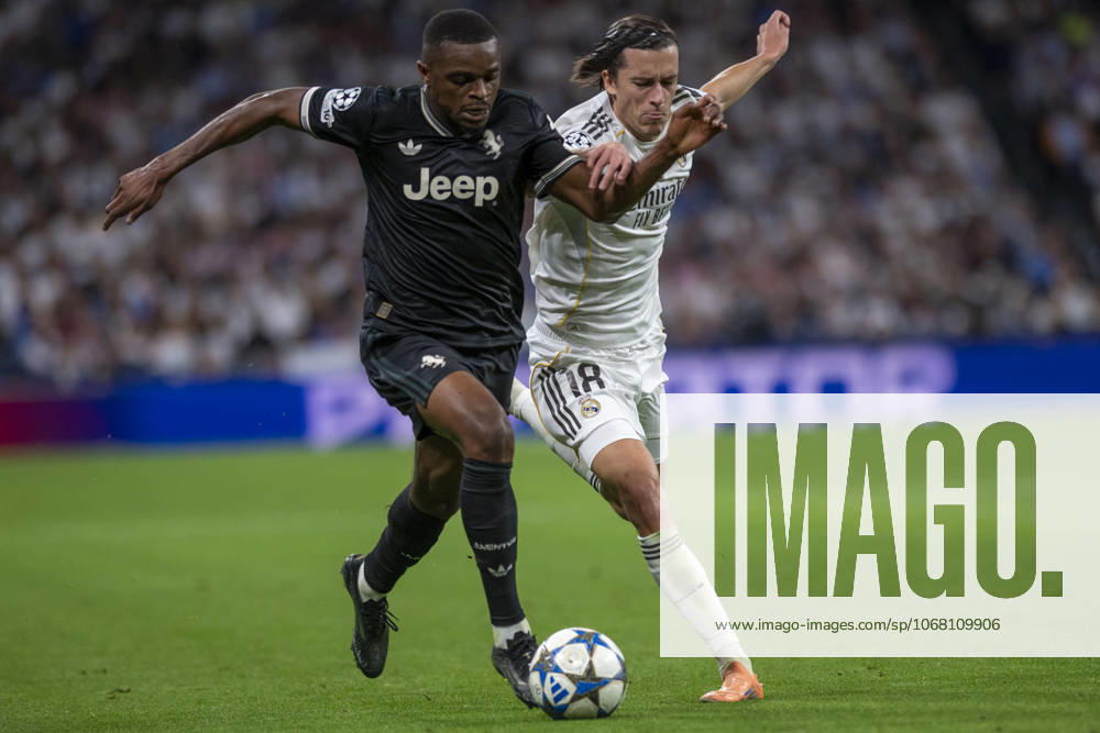 ALVARO CARRERAS of Real Madrid CF and PIERRE KALULU of Juventus de Turin in action during the match on the third day of the group stage of the 2025 26 UEFA Champions League between REAL MADRID C.F. vs JUVENTUS DE TURIN, played at the Santiago Bernabeu Stadium on October 22, 2025, in Madrid, Spain. Madrid Spain - ZUMAc312 20251022_zsp_c312_049