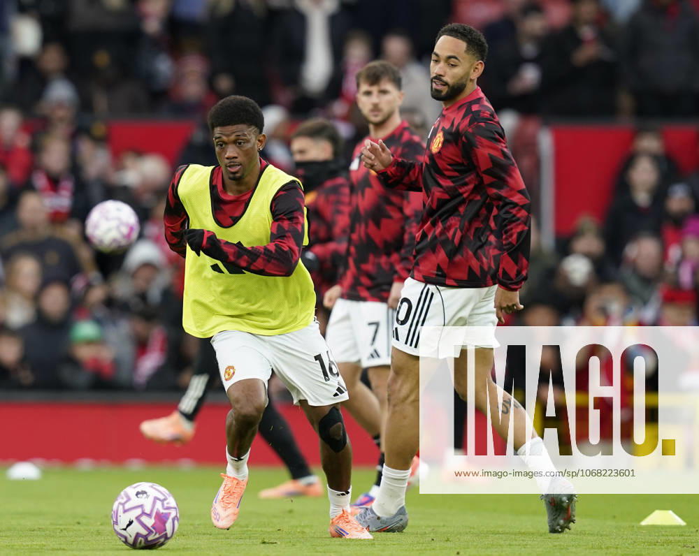 Manchester, England, 25th October 2025. Amad Diallo of Manchester United, ManU (l) and Matheus Cunha of Manchester United (r) warm up before the Manchester United vs Brighton and Hove Albion Premier League match at Old Trafford, Manchester. Picture credit should read: Andrew Yates Sportimage . SPI_012_AY_Man_Utd_Brighton SPI-4237-0011