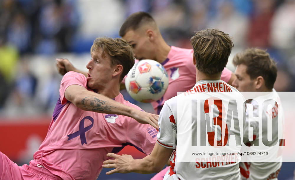 Penalty area scene, goal area scene header duel duel action Wouter Tohumcu TSG 1899 Hoffenheim 18 vs Jan Schoeppner 1 FC Heidenheim 1846 FCH 03 TSG 1899 Hoffenheim vs 1 FC Heidenheim 1846 FCH 25 10 2025 DFL REGULATIONS PROHIBIT ANY USE OF PHOTOGRAPHS AS IMAGE SEQUENCES AND OR QUASI VIDEO TSG 1899 Hoffenheim vs 1 FC Heidenheim 1846 FCH