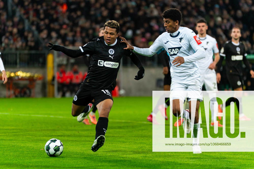 Joel Chima Fujita FC St Pauli, 16 dribbling against Bernardo TSG 1899 Hoffenheim, 13 , GER, FC St Pauli vs TSG 1899 Hoffenheim, Soccer, DFB Pokal, 2 Round, Season 2025 2026, 28 10 2025 DFL REGULATES PROHIBIT ANY USE OF PHOTOGRAPHS AS IMAGE SEQUENCES AND OR QUASI VIDEO GER, FC St Pauli vs TSG 1899 Hoffenheim, Football, DFB Pokal, 2nd round, 2025 2026 season, 28 10 2025 Hamburg