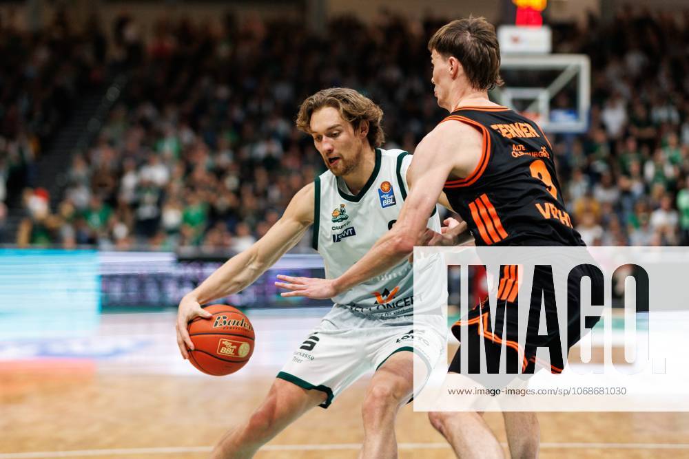 Marco Hollersbacher Gladiators Trier in a duel with Joschka Ferner Rasta Vechta , Vet Concept Gladiators Trier vs Rasta Vechta, Basketball, easyCredit BBL, Matchday 6, Season 2025 2026, 02 11 2025 Vet Concept Gladiators Trier vs Rasta Vechta, Basketball, easyCredit BBL, Matchday 6, Season 2025 2026
