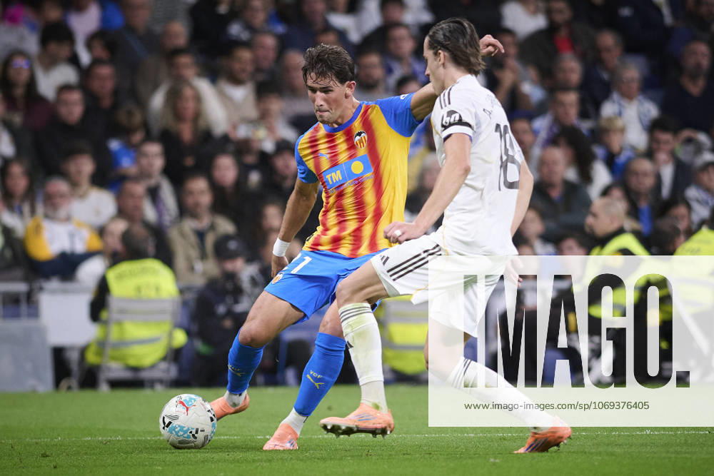 Real Madrid CFs Alvaro Carreras (R) and Valencia CFs Jesus Vazquez during La Liga match. November 01 ,2025. (20251101519)