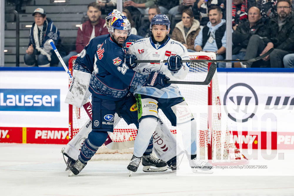Ryan Murphy EHC Red Bull Muenchen, 24 defends against Tim Brunnhuber Straubing Tigers, 19 in front of Antoine Bibeaus goal Goalkeeper, EHC Red Bull Muenchen, 30 GER, EHC Red Bull Muenchen vs Straubing Tigers, Ice Hockey, DEL, 22 Matchday, Season 2025 2026, 25 11 2025 GER, EHC Red Bull Muenchen vs Straubing Tigers, Ice Hockey, DEL, 22 Matchday, Season 2025 2026, 25 11 2025 Muenchen