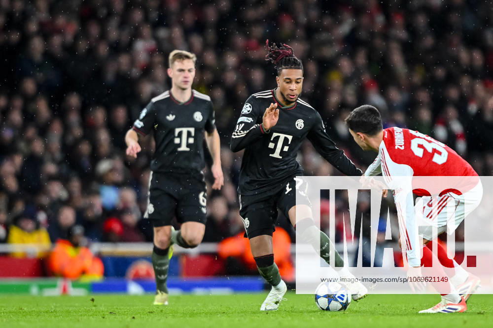 Joshua Kimmich Bayern Munich , Michael Olise Bayern Munich and Martin Zubimendi Arsenal FC battle for the ball during the UEFA Champions League 2025 26 League Phase MD5 match between Arsenal FC and FC Bayern Munich at Arsenal Stadium on November 26, 2025 in London, United Kingdom Photo by Harry Langer DeFodi Images