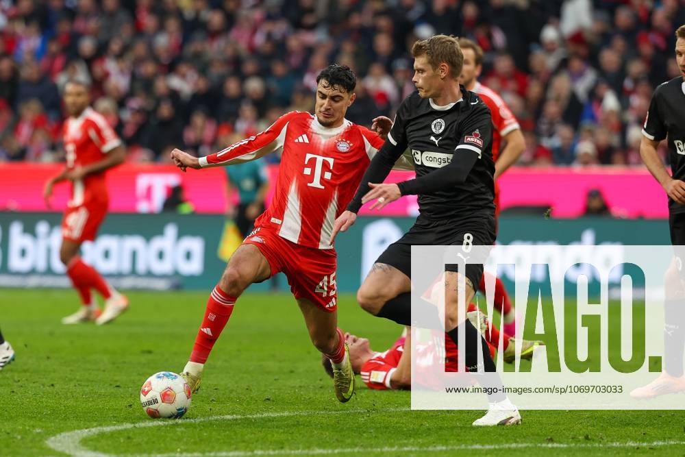 In duel, action, with Alexandar Pavlovic 45 FC Bayern Muenchen , Eric Smith 8 FC St Pauli , FC Bayern Muenchen vs FC St Pauli, Soccer, 1 Bundesliga, 12 Matchday, 29 11 2025 DFB regulations prohibit any use of photographs as image sequences and or quasi video Muenchen Bayern Germany