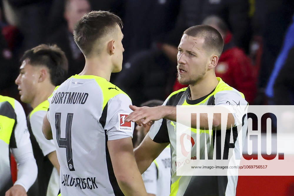 Nico Schlotterbeck Borussia Dortmund and Waldemar Anton Borussia Dortmund cheer, Bundesliga, Bayer 04 Leverkusen v Borussia Dortmund, BayArena, November 29, 2025 in Leverkusen, Germany Photo by Marco Steinbrenner DeFodi Images Nico Schlotterbeck Borussia Dortmund and Waldemar Anton Borussia Dortmund cheer, Bundesliga, Bayer 04 Leverkusen v Borussia Dortmund, BayArena, November 29, 2025 in Leverkusen, Germany Photo by Marco Steinbrenner DeFodi Images DFL regulations prohibit any use of photographs as image sequences and or quasi video