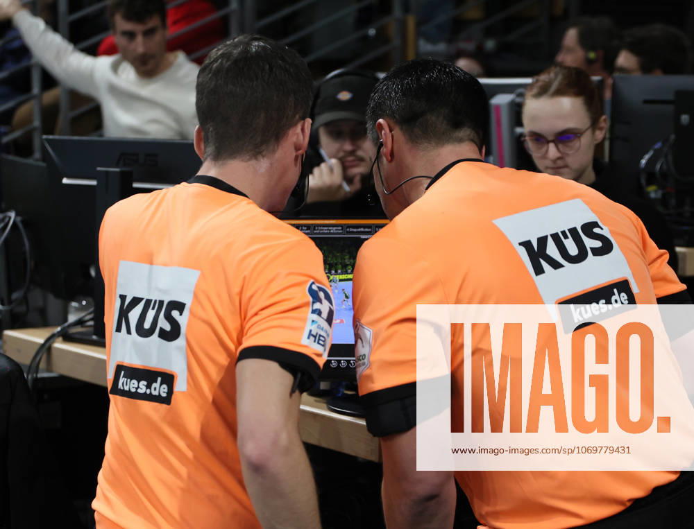 GER HBL season 2025 2026 FÜCHSE Berlin vs TBV Lemgo Lippe, 30 11 25, Max Schmeling Halle, Berlin, Andre Plischek HBL referee and Fabian Baumgartt, HBL referee check the video evidence