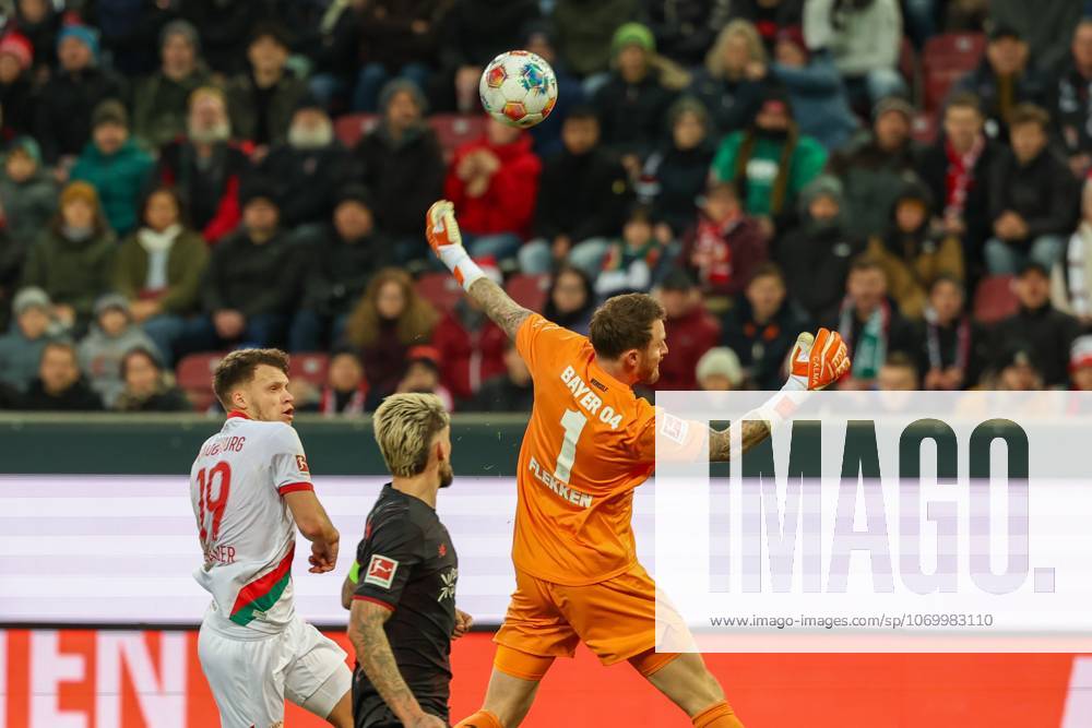 In duel, action, with Robin Fellhauer 19 FC Augsburg , Robert Andrich 8 Bayer 04 Leverkusen , Mark Flekken 1 Bayer 04 Leverkusen , FC Augsburg vs Bayer 04 Leverkusen, Football, 1 Bundesliga, 13 Matchday, 06 12 2025 DFB regulations prohibit any use of photographs as image sequences and or quasi video Augsburg Bayern Germany