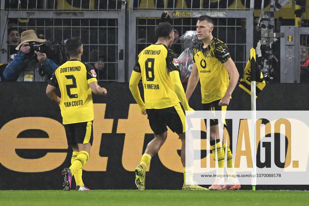 Nico Schlotterbeck Dortmund 4 celebrates after scoring 2 0 with Felix Nmecha Dortmund 8 Yan Couto Dortmund 2 07 12 2025 Football Borussia Dortmund vs TSG Hoffenheim, Signal Iduna Park, Dortmund, DFB DFL REGULATIONS PROHIBIT ANY USE OF PHOTOGRAPHS AS IMAGE SEQUENCES AND OR QUASI VIDEO