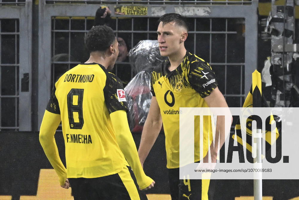 Nico Schlotterbeck Dortmund 4 celebrates after scoring the 2-0 goal with Felix Nmecha Dortmund 8 07 12 2025 Football Borussia Dortmund vs TSG Hoffenheim, Signal Iduna Park, Dortmund, DFB DFL REGULATIONS PROHIBIT ANY USE OF PHOTOGRAPHS AS IMAGE SEQUENCES AND OR QUASI VIDEO