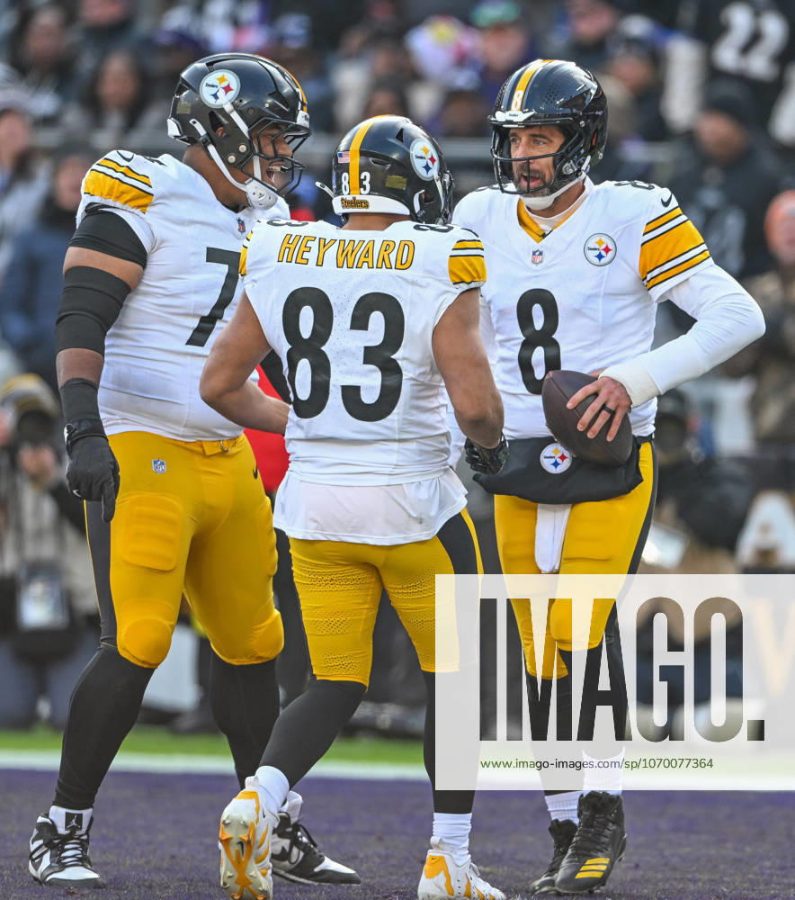 Pittsburgh Steelers quarterback Aaron Rodgers (8) celebrates with tight end Connor Heyward (83) after a one yard keep play and a touchdown against the Baltimore Ravens during the first quarter at M&T Bank Stadium in Baltimore, Maryland, on Sunday, December 7 2025. BAL20251207121 DAVIDxTULIS