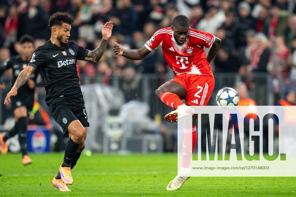 In duel, action, with Dayot Upamecano 2 FC Bayern Muenchen , FC Bayern Muenchen vs Sporting Lisbon, Soccer, Champions League, Matchday 6, 09 12 2025 Muenchen Bayern Germany