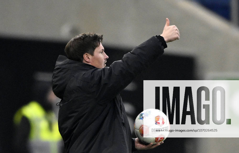 Coach Coach Merlin Polzin Hamburger SV HSV on the sidelines Gesture Gesture Thumbs up with match ball TSG 1899 Hoffenheim vs Hamburger SV HSV 13 12 2025 DFL REGULATIONS PROHIBIT ANY USE OF PHOTOGRAPHS AS IMAGE SEQUENCES AND OR QUASI VIDEO TSG 1899 Hoffenheim vs Hamburger SV HSV