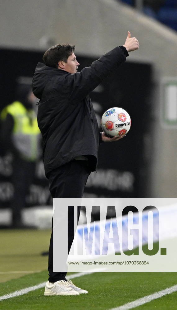 Coach Coach Merlin Polzin Hamburger SV HSV on the sidelines Gesture Gesture Thumbs up with match ball TSG 1899 Hoffenheim vs Hamburger SV HSV 13 12 2025 DFL REGULATIONS PROHIBIT ANY USE OF PHOTOGRAPHS AS IMAGE SEQUENCES AND OR QUASI VIDEO TSG 1899 Hoffenheim vs Hamburger SV HSV