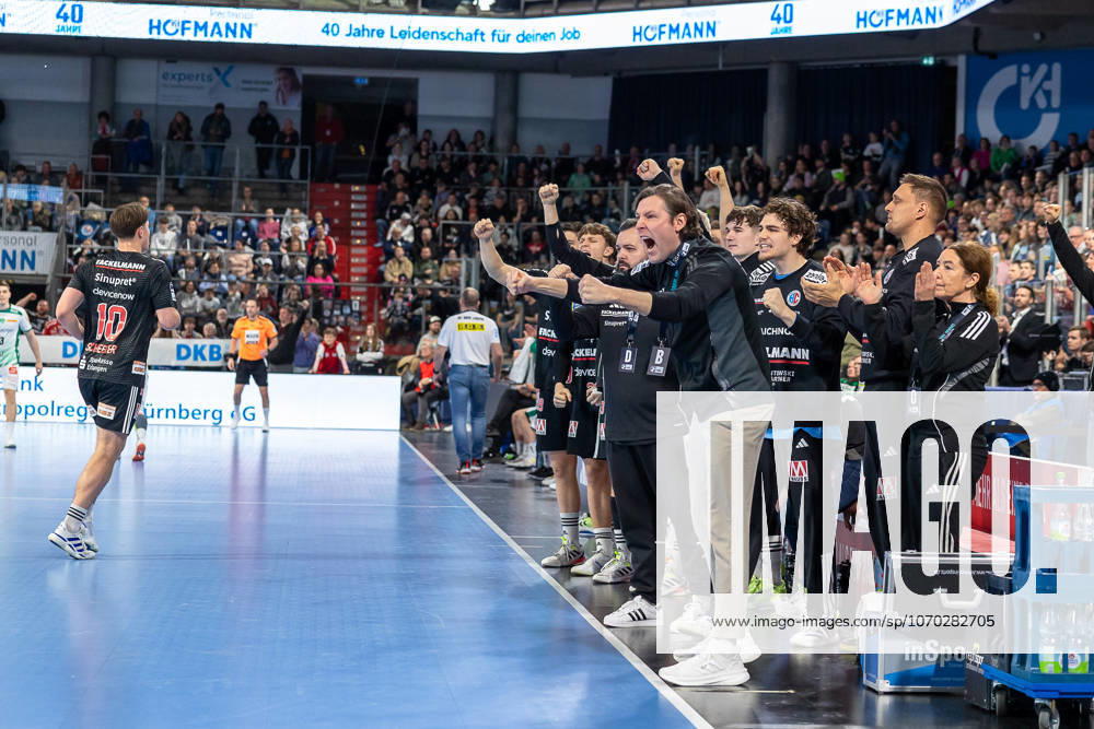 Juebl at Johannes Sellin HC Erlangen, Head Coach and the Erlangen bench, Florian Scheerer HC Erlangen, 10 HC Erlangen vs SC DHfK Leipzig, Handball, 1 Handball Bundesliga, Season 2025 2026, 17 Matchday, 13 12 2025 HC Erlangen vs SC DHfK Leipzig, Handball, 1 Handball Bundesliga, Season 2025 2026, 17 Matchday, 13 12 2025 Nuremberg