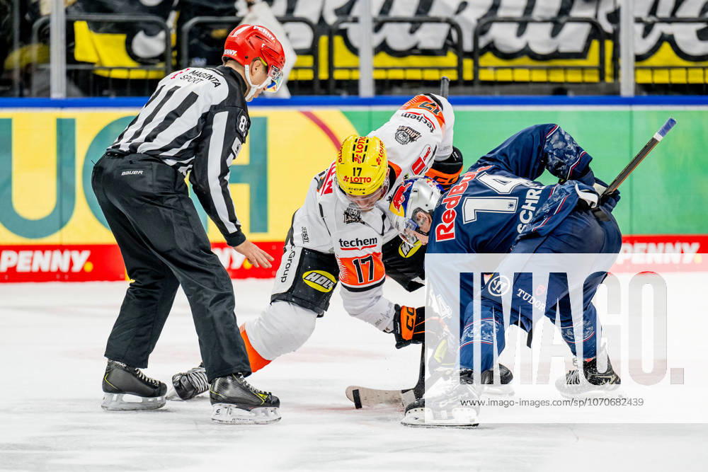 Linesperson David Tschirner takes a faceoff between Carter Rowney Loewen Frankfurt, 17 and Vadim Schreiner EHC Red Bull Muenchen, 14 GER, EHC Red Bull Muenchen vs Loewen Frankfurt, Ice Hockey, DEL, Matchday 32, Season 2025 2026, 26 12 2025 GER, EHC Red Bull Muenchen vs Loewen Frankfurt, Ice Hockey, DEL, Matchday 32, Season 2025 2026, 26 12 2025 Muenchen