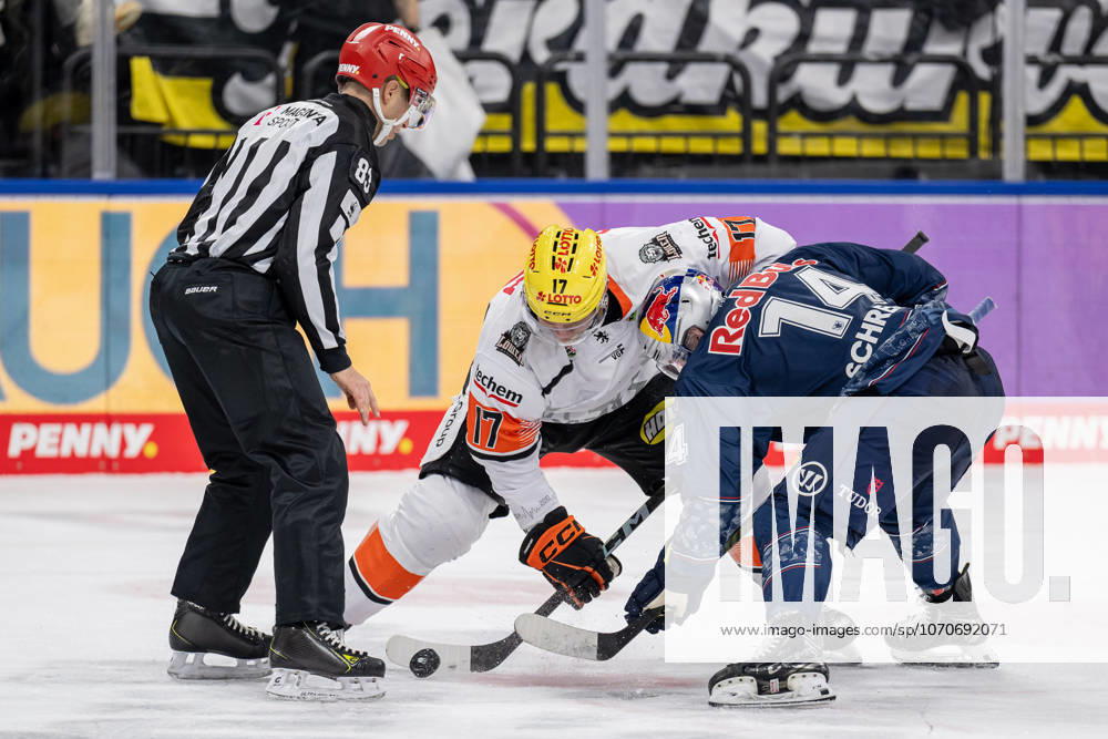 Linesperson David Tschirner takes a faceoff between Carter Rowney Loewen Frankfurt, 17 and Vadim Schreiner EHC Red Bull Muenchen, 14 GER, EHC Red Bull Muenchen vs Loewen Frankfurt, Ice Hockey, DEL, Matchday 32, Season 2025 2026, 26 12 2025 GER, EHC Red Bull Muenchen vs Loewen Frankfurt, Ice Hockey, DEL, Matchday 32, Season 2025 2026, 26 12 2025 Muenchen