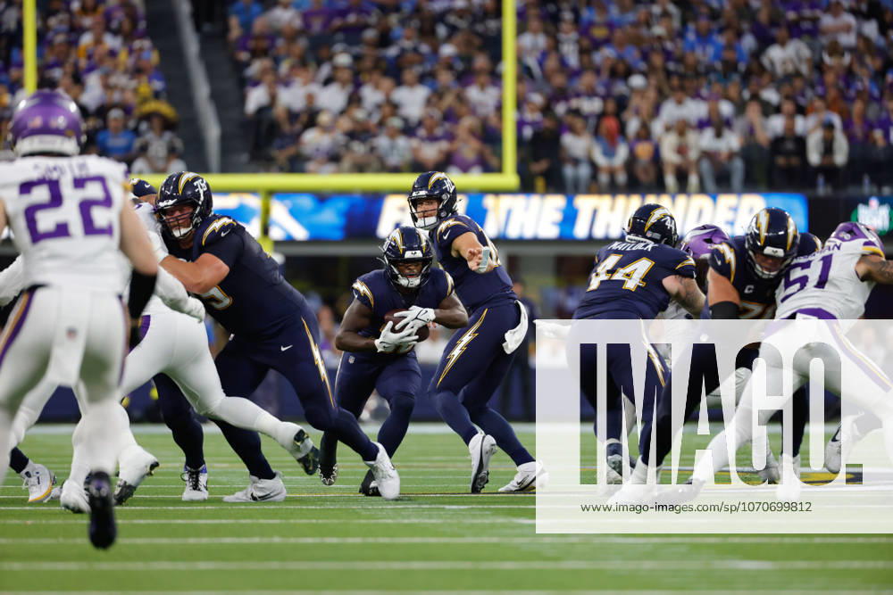 INGLEWOOD, CA - OCTOBER 23: Los Angeles Chargers running back Kimani Vidal (30) finds a hole to run through during the NFL, American Football Herren, USA game between the Minnesota Vikings and the Los Angeles Chargers on October 23, 2025, at SoFi Stadium in Inglewood, CA. (Photo by Jevone Moore Icon Sportswire) NFL: OCT 23 Vikings at Chargers Icon20251023053
