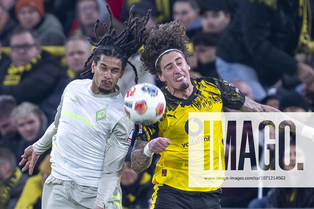 Football Borussia Dortmund SV Werder Bremen, Matchday 17 at Signal Iduna Park Isaac Schmidt Werder Bremen l and Fabio Silva Borussia Dortmund fight for the ball IMPORTANT NOTE In accordance with the regulations of the DFL and the DFB, it is prohibited to use or have used photographs taken in the stadium and or of the match in the form of sequential images and or video-like photo series
