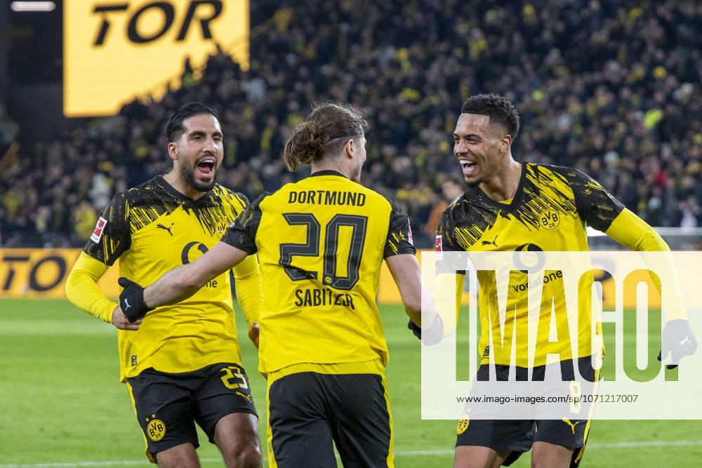 Football Borussia Dortmund SV Werder Bremen, Matchday 17 at Signal Iduna Park Emre Can Borussia Borussia Dortmund , Marcel Sabitzer Borussia Dortmund and Felix Nmecha Borussia Dortmund cheer after his goal for 2 0 IMPORTANT NOTICE According to the regulations of the DFL and the DFB, it is prohibited to use or have used photographs taken in the stadium and or of the match in the form of sequential images and or video-like photo series
