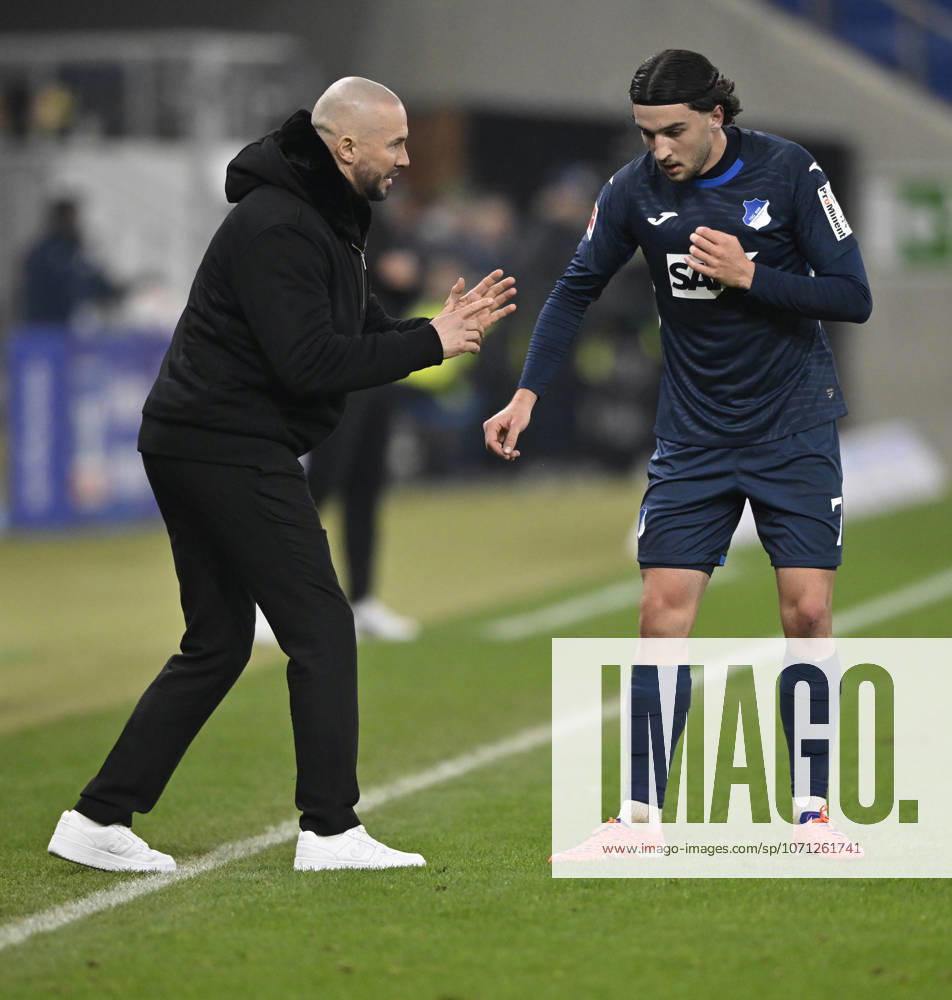 Coach Christian Ilzer TSG 1899 Hoffenheim on the sidelines in discussion with Leon Avdullahu TSG 1899 Hoffenheim 07 TSG 1899 Hoffenheim vs Borussia Moenchengladbach BMG 14 01 2026 DFL REGULATIONS PROHIBIT ANY USE OF PHOTOGRAPHS AS IMAGE SEQUENCES AND OR QUASI VIDEO TSG 1899 Hoffenheim vs Borussia Moenchengladbach BMG Sinsheim