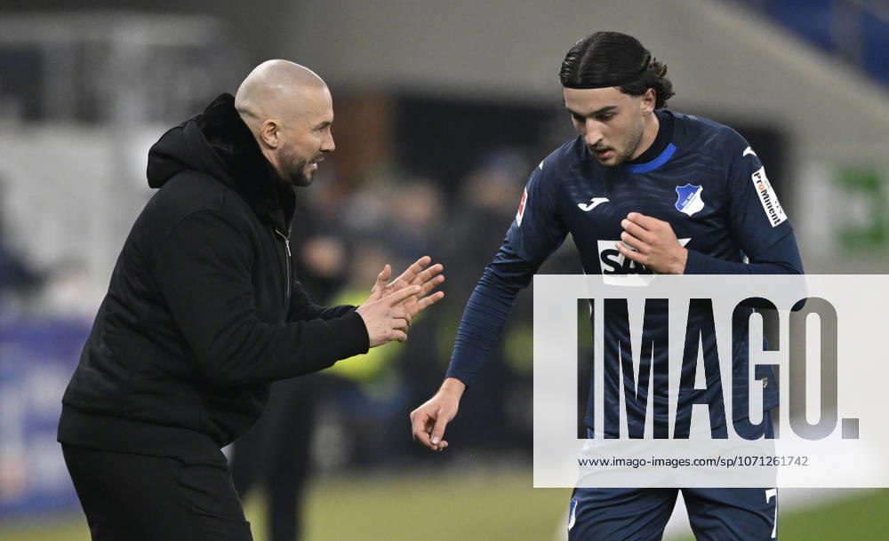 Coach Christian Ilzer TSG 1899 Hoffenheim on the sidelines in discussion with Leon Avdullahu TSG 1899 Hoffenheim 07 TSG 1899 Hoffenheim vs Borussia Moenchengladbach BMG 14 01 2026 DFL REGULATIONS PROHIBIT ANY USE OF PHOTOGRAPHS AS IMAGE SEQUENCES AND OR QUASI VIDEO TSG 1899 Hoffenheim vs Borussia Moenchengladbach BMG Sinsheim