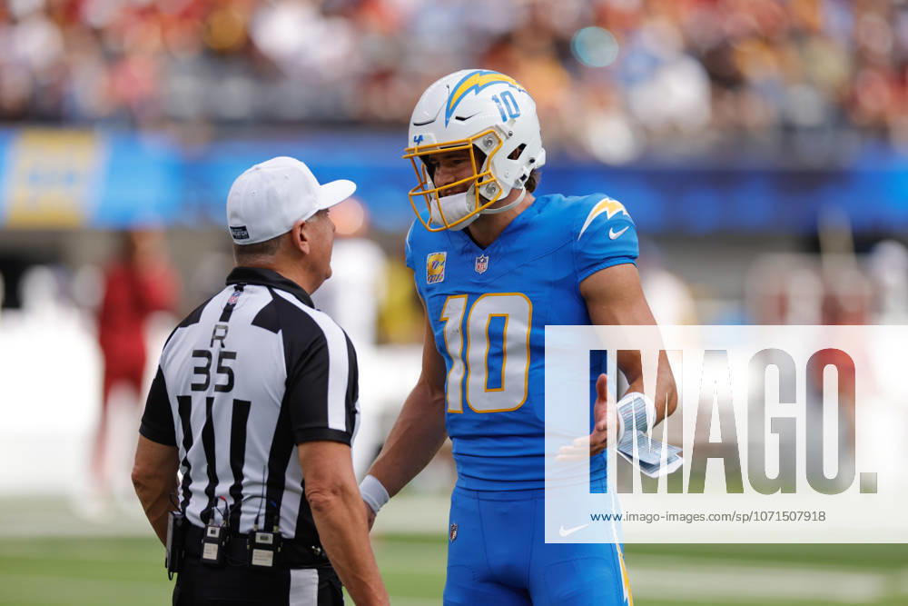 INGLEWOOD, CA - OCTOBER 5: Los Angeles Chargers quarterback Justin Herbert (10) talks with referee John Hussey (35) during the NFL, American Football Herren, USA game between the Washington Commanders and the Los Angeles Chargers on October 05, 2025, at SoFi Stadium in Inglewood, CA. (Photo by Jevone Moore Icon Sportswire) NFL: OCT 05 Commanders at Chargers Icon20251005005