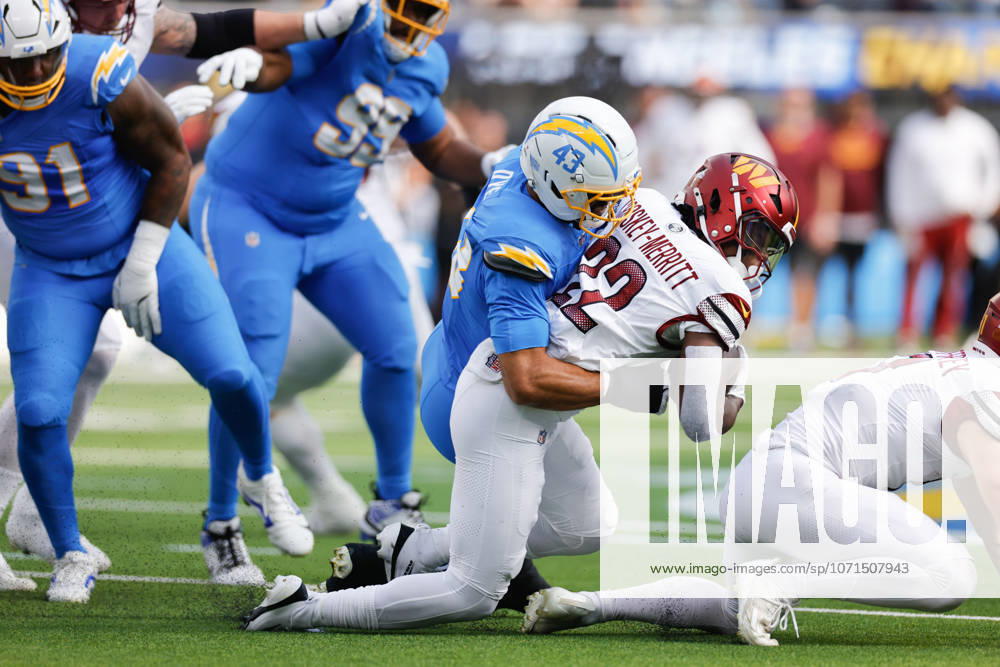 INGLEWOOD, CA - OCTOBER 5: Los Angeles Chargers linebacker Troy Dye (43) takes down Washington Commanders running back Jacory Croskey-Merritt (22) during the NFL, American Football Herren, USA game between the Washington Commanders and the Los Angeles Chargers on October 05, 2025, at SoFi Stadium in Inglewood, CA. (Photo by Jevone Moore Icon Sportswire) NFL: OCT 05 Commanders at Chargers Icon20251005018