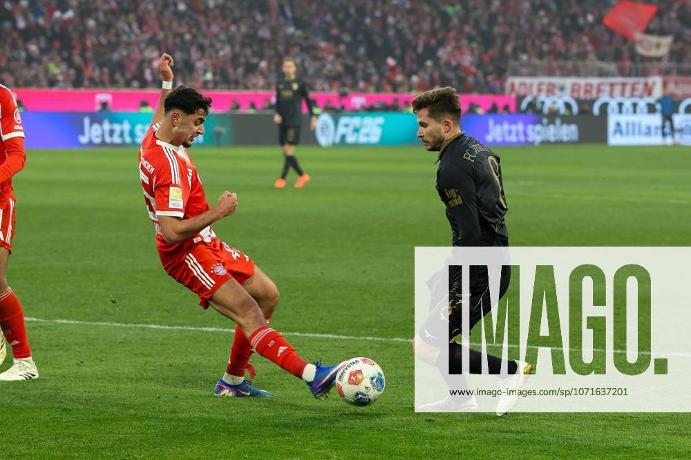 In duel, action, with Alexandar Pavlovic 45 FC Bayern Muenchen , Elvis Rexhbecaj 8 FC Augsburg , FC Bayern Muenchen vs FC Augsburg, Soccer, 1 Bundesliga, 19 Matchday, 24 01 2026 DFB regulations prohibit any use of photographs as image sequences and or quasi video Muenchen Bayern Germany