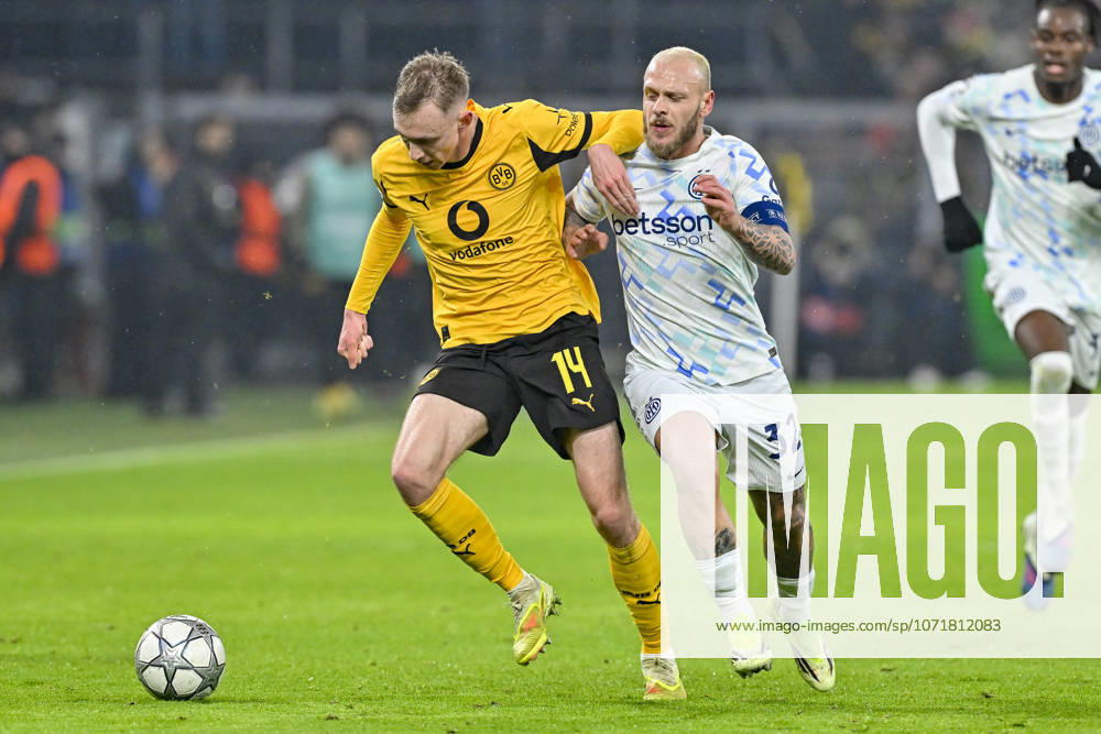 From left in duel Maximilian Beier Dortmund 14 Federico Dimarco Inter 32 28 01 2026 Football, Champions League, Borussia Dortmund vs Inter Milan , Signal Iduna Park, Dortmund,
