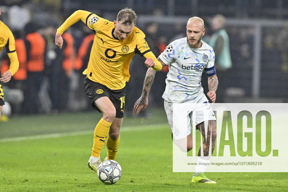 From left in duel Maximilian Beier Dortmund 14 Federico Dimarco Inter 32 28 01 2026 Football, Champions League, Borussia Dortmund vs Inter Milan , Signal Iduna Park, Dortmund,
