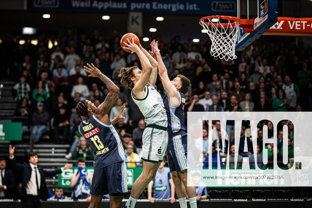Marco Hollersbacher Gladiators Trier in a duel with J Wan Roberts Alba Berlin and Martynas Echodas Alba Berlin , Vet Concept Gladiators Trier vs Alba Berlin, Basketball, easyCredit BBL, Matchday 18, Season 2025 2026, 02 02 2026 Vet Concept Gladiators Trier vs Alba Berlin, Basketball, easyCredit BBL, Matchday 18, Season 2025 2026