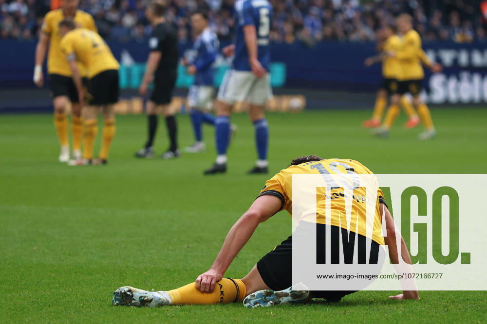 Alexander Rossipal SG Dynamo Dresden lies on the ground during the match of the 2 Bundesliga season 2025 26 FC Schalke 04 Dynamo Dresden Copyright Thomas Pakusch