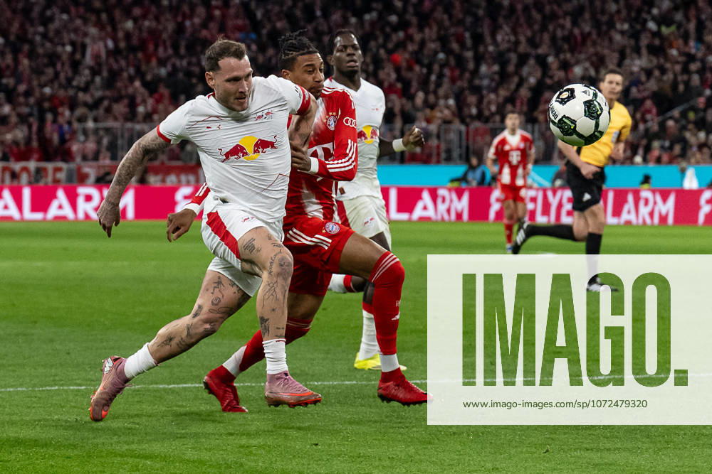 Fight for the ball duel between Michael Olise FC Bayern Muenchen, 17 and David Raum RB Leipzig, 22 GER, FC Bayern Muenchen vs RB Leipzig, Football, DFB Pokal, Quarterfinal, Season 2025 2026, 11 02 2026 GER, FC Bayern Muenchen vs RB Leipzig, Football, DFB Cup, quarter-finals, 2025 2026 season, 11 02 2026 Muenchen