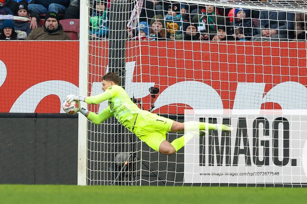 Goalkeeper action by Finn Dahmen 1 FC Augsburg , FC Augsburg vs 1 FC Heidenheim, Football, 1 Bundesliga, 22 Matchday, 15 02 2026 DFB regulations prohibit any use of photographs as image sequences and or quasi video Augsburg Bayern Germany