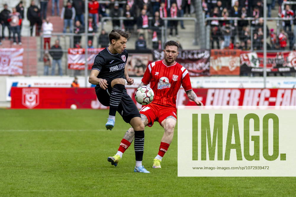 Regionalliga Nordost Season 25 26 Hallescher FC vs Greifswalder FC Halle, Germany February 21, 2026 In the picture from left in the duel Joe Joe Richardson Greifswald and Jan Löhmannsröben Loehmannsroeben Halle Halle Saale Leuna Chemie Stadion Sachsen Anhalt Germany