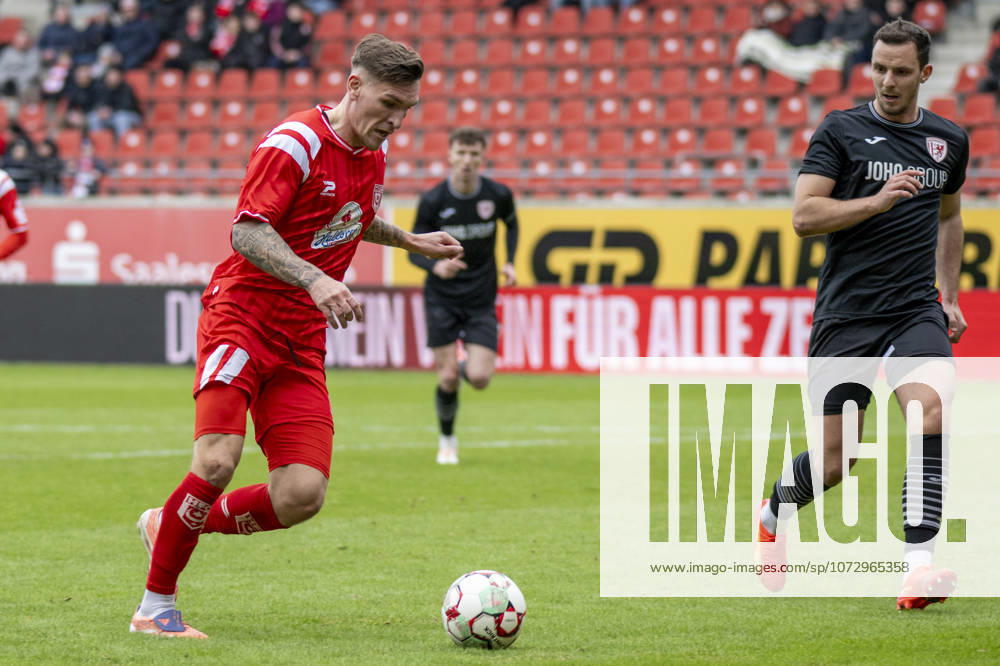 Regionalliga Nordost Season 25 26 Hallescher FC vs Greifswalder FC Halle, Germany February 21, 2026 In the picture from left Niclas Stierlin Halle and Bastian Strietzel Greifswald Halle Saale Leuna Chemie Stadion Sachsen Anhalt Germany