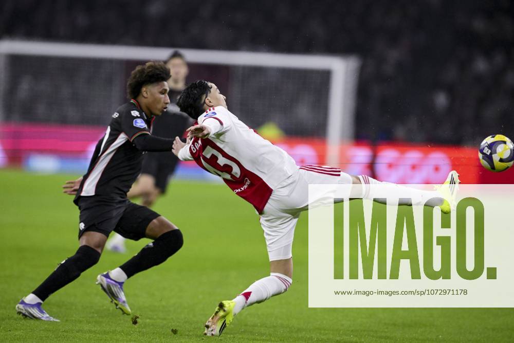 AMSTERDAM (l-r) Noà Lebreton of NEC Nijmegen and Rayane Bounida of AFC Ajax during the Dutch Eredivisie match between AFC Ajax and NEC at the Johan Cruijff ArenA on February 21, 2026, in Amsterdam, Netherlands. OLAF KRAAK ANP Eredivisie 2025-2026 ANPxSportx IVx 551394995 originalFilename: 551394995