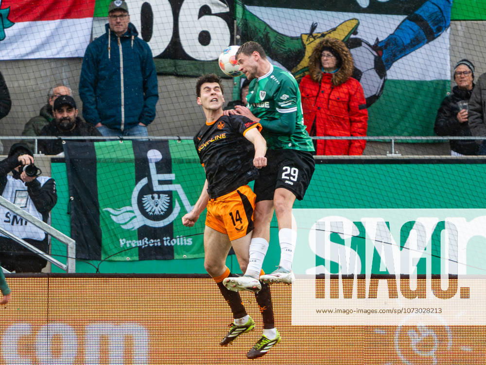 Jacob Rasmussen 1 FC Kaiserslautern, 14 in header duel against Imad Rondic SC Preussen Muenster, 29 Preussen Muenster vs 1 FC Kaiserslautern, Soccer, 2 Bundesliga, Matchday 23, Season 2025 2026, 22 02 2026 DFL REGULATES PROHIBIT ANY USE OF PHOTOGRAPHS AS IMAGE SEQUENCES AND OR QUASI VIDEO, Preussen Muenster vs 1 FC Kaiserslautern, Football, 2 Bundesliga, Matchday 23, Season 2025 2026, 22 02 2026 Muenster