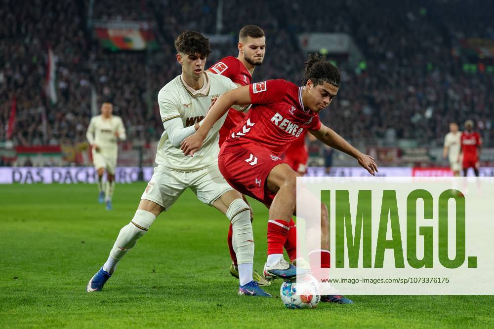 In duel, action, with Rodrigo Ribeiro 21 FC Augsburg , Jahmai Simpson Pusey 22 1 FC Koeln , FC Augsburg vs 1 FC Koeln, Football, 1 Bundesliga, 24 Matchday, 27 02 2026 DFB regulations prohibit any use of photographs as image sequences and or quasi video Augsburg Bayern Germany