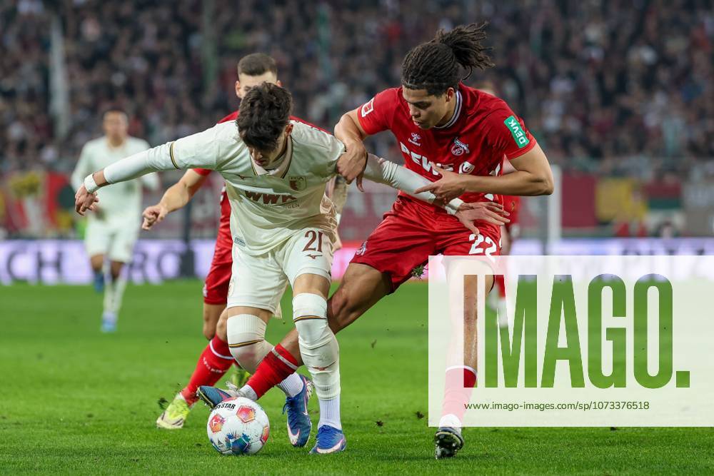 In duel, action, with Rodrigo Ribeiro 21 FC Augsburg , Jahmai Simpson Pusey 22 1 FC Koeln , FC Augsburg vs 1 FC Koeln, Football, 1 Bundesliga, 24 Matchday, 27 02 2026 DFB regulations prohibit any use of photographs as image sequences and or quasi video Augsburg Bayern Germany