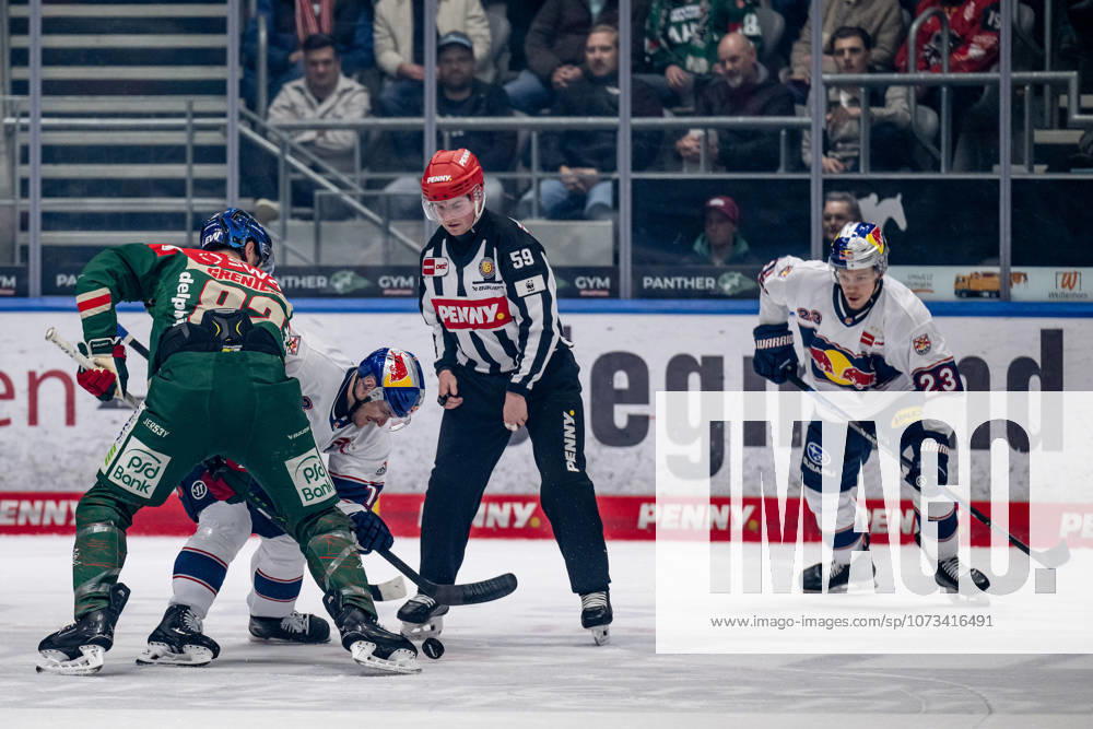 Linesperson Jonas Reinold takes a faceoff between Alexandre Grenier Augsburger Panther, 82 and Brady Ferguson EHC Red Bull Muenchen, 12 , right Alberts Smits EHC Red Bull Muenchen, 23 GER, Augsburger Panther vs EHC Red Bull Muenchen, Ice Hockey, DEL, 46 Matchday, Season 2025 2026, 27 02 2026 GER, Augsburger Panther vs EHC Red Bull Muenchen, Ice Hockey, DEL, 46 Matchday, Season 2025 2026, 27 02 2026 Augsburg