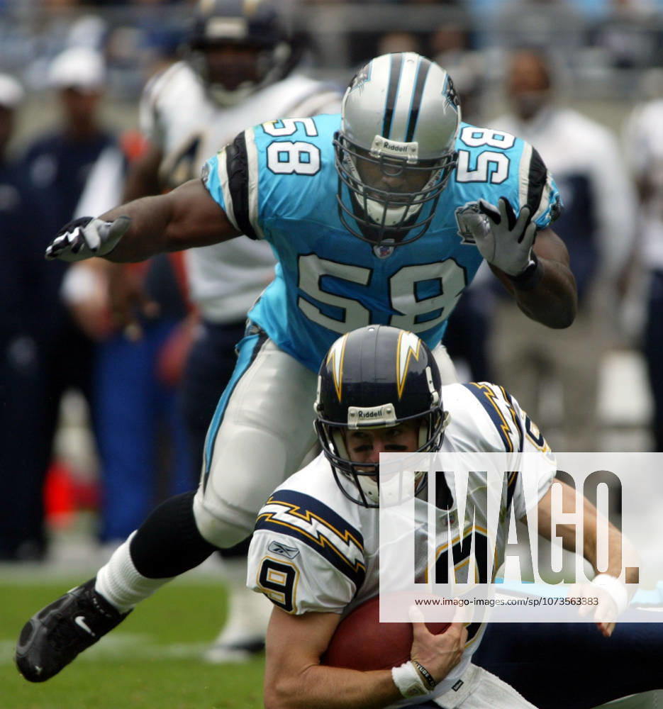 Oct 24, 2004; Charlotte, NC, USA; Carolina Panthers linebacker MARK FIELDS (58) tackles San Diego Chargers quarterback DREW BREES in the first half at Bank of America Stadium in Charlotte. San Diego won, 16-6. Charlotte North Carolina U.S.