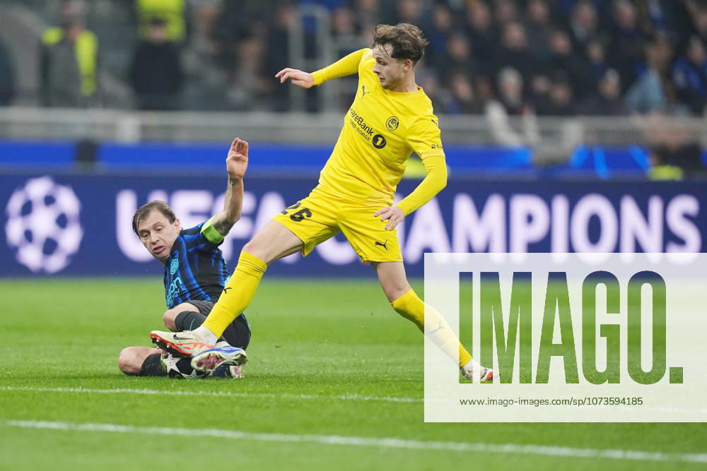 Inter Milans Nicolo Barella fights for the ball Glimts Hakon Evjen during the Uefa Champions League soccer match between Inter and Bodo Glimt at the San Siro Stadium in Milan , north Italy - Tuesday , February 24 , 2026. - Soccer .