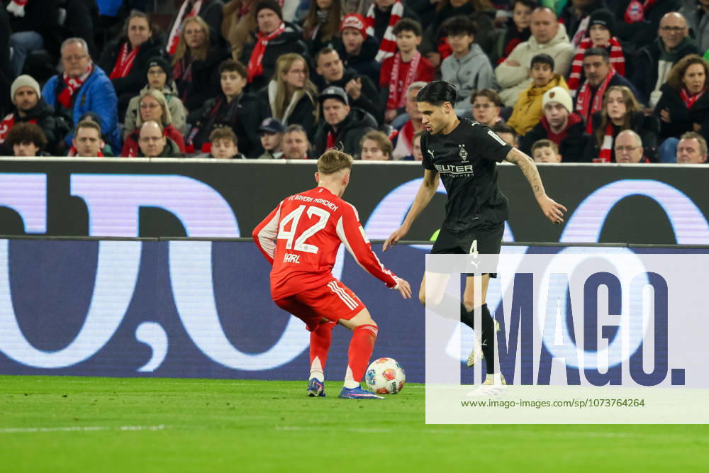 Kevin Diks Borussia Mönchengladbach, 04 with Lennart Karl FC Bayern Muenchen, 42 , GER, FC Bayern Muenchen vs Borussia Mönchengladbach, Football, Bundesliga, 25 Matchday, Season 2025 2026, 06 03 2026, , GER, FC Bayern Muenchen vs Borussia Mönchengladbach, Football, Bundesliga, 25 Matchday, Season 2025 2026, 06 03 2026 Muenchen
