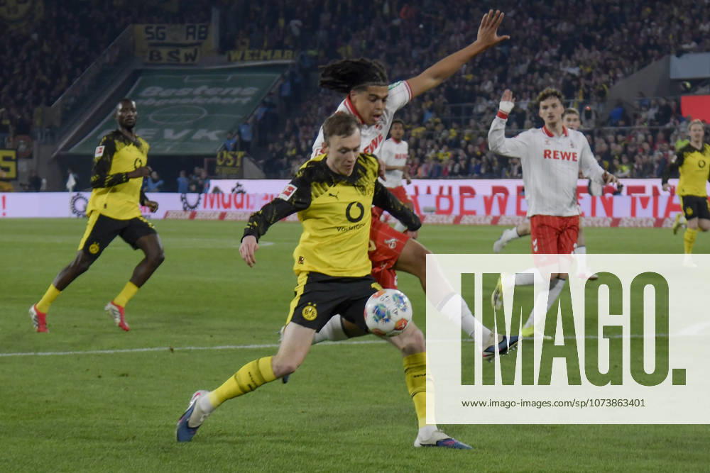 From left in duel Maximilian Beier Dortmund 14 Jahmai Simpson Pusey Koeln 22 07 03 2026¢ Football ¢ 1 FC Koeln vs Borussia Dortmund , Rheinenergiestadion, Koeln, DFB DFL REGULATIONS PROHIBIT ANY USE OF PHOTOGRAPHS AS IMAGE SEQUENCES AND OR QUASI VIDEO