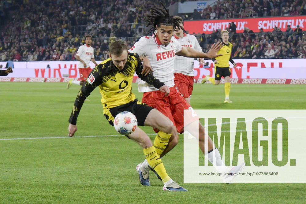 From left in duel Maximilian Beier Dortmund 14 Jahmai Simpson Pusey Koeln 22 07 03 2026¢ Football ¢ 1 FC Koeln vs Borussia Dortmund , Rheinenergiestadion, Koeln, DFB DFL REGULATIONS PROHIBIT ANY USE OF PHOTOGRAPHS AS IMAGE SEQUENCES AND OR QUASI VIDEO