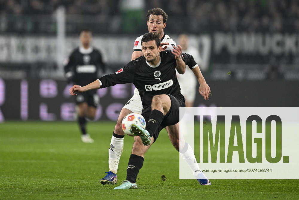 V li in duel Joe Scally Moenchengladbach 29 Adam Dzwigala Pauli 25 13 03 2026 ¢ Football ¢ Borussia Moenchengladbach vs FC St Pauli, Borussia Park, Moenchengladbach, DFB DFL REGULATIONS PROHIBIT ANY USE OF PHOTOGRAPHS AS IMAGE SEQUENCES AND OR QUASI VIDEO