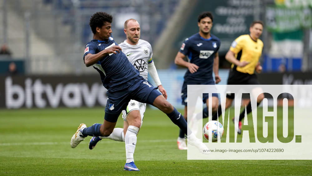 V li Bernardo Fernandes da Silva Junior Hoffenheim, 13 , Christian Eriksen Wolfsburg, 24 , duel, duel scene, duel, tackle, tackling, dynamics, action, 14 03 2026, Sinsheim Germany , Football, Bundesliga, TSG 1899 Hoffenheim VfL Wolfsburg, DFB DFL REGULATIONS PROHIBIT ANY USE OF PHOTOGRAPHS AS IMAGE SEQUENCES AND OR QUASI VIDEO