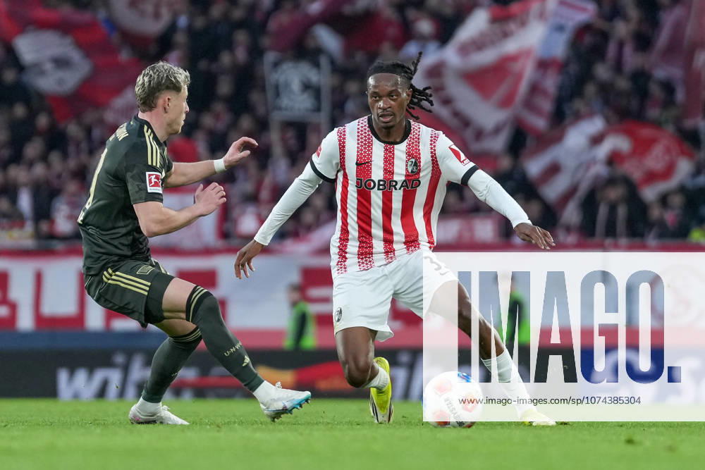Tim Skarke 1 FC Union Berlin, 21 in duel with Jordy Makengo SC Freiburg, 33 , Germany, Soccer, 1 Bundesliga, Matchday 26, 2025 2026, SC Freiburg vs 1 FC Union Berlin, 15 03 2026, Europa Park Stadion, Freiburg, Germany DFL REGULATIONS PROHIBIT ANY USE OF PHOTOGRAPHS AS IMAGE SEQUENCES AND OR QUASI VIDEO Freiburg Europa Park Stadion Baden Württemberg Germany
